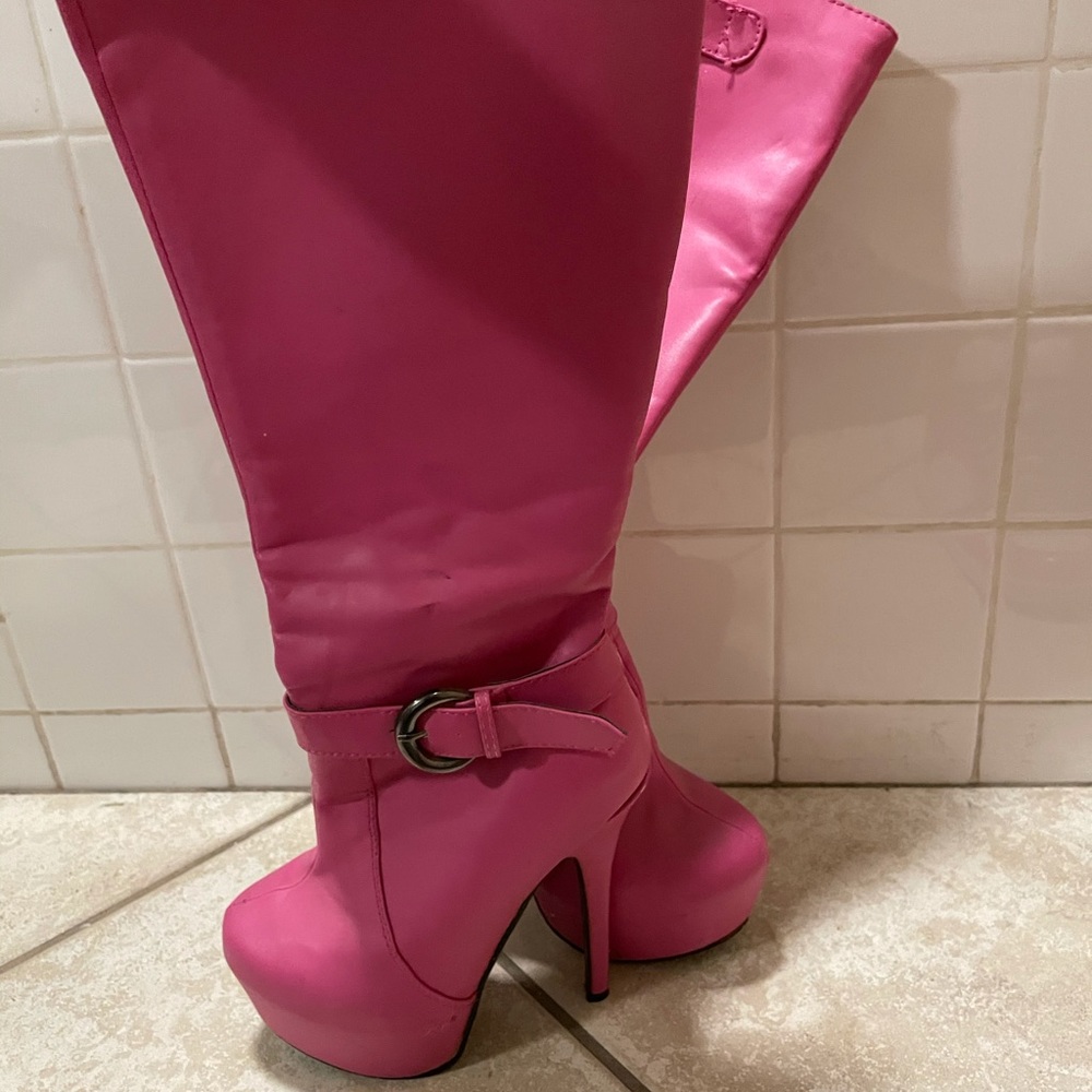 Hot pink knee high boots